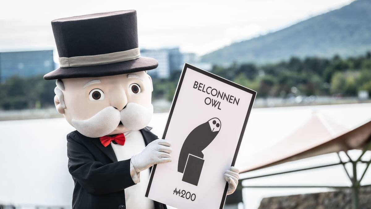 Mr Monopoly revealed each of the squares on the board of the Canberra Monopoly game, including the Belco Owl. Picture by Karleen Minney