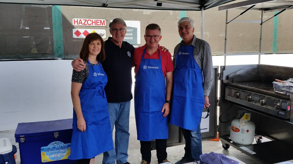 At a Bunnings sausage fundraiser with Vinnies volunteers. Picture: Supplied