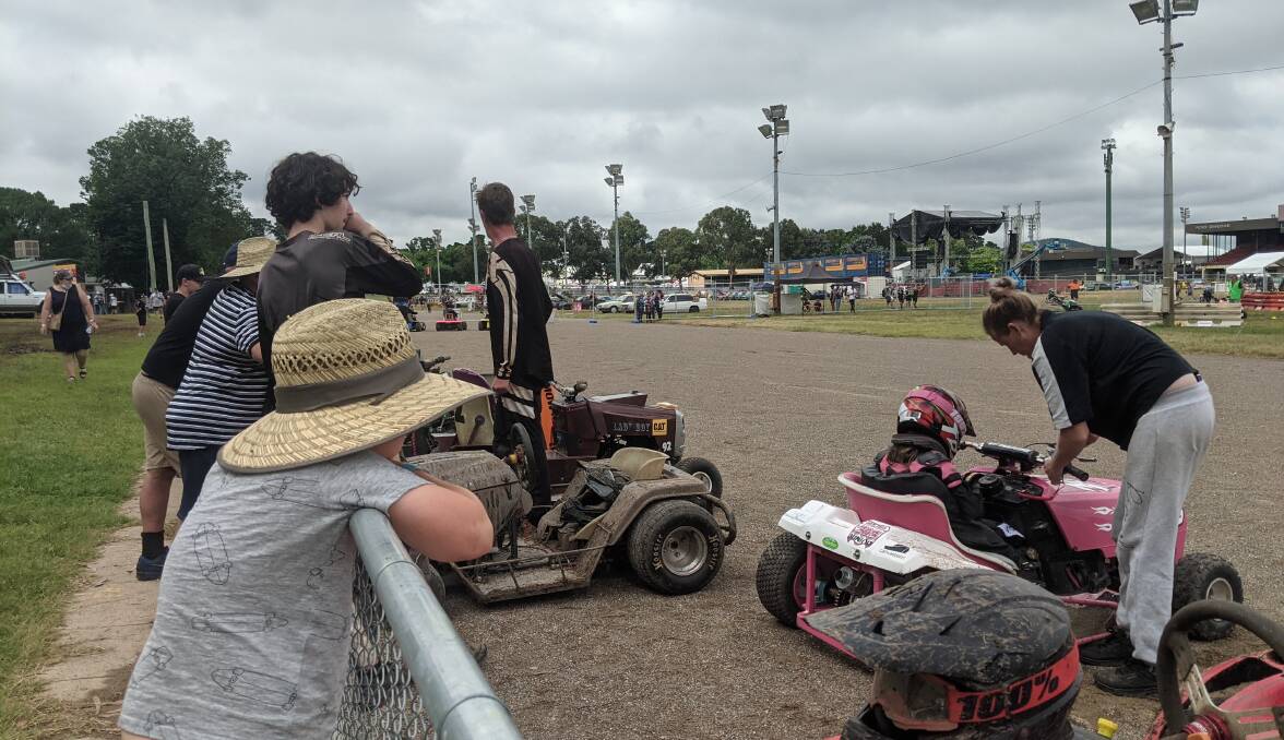 Checking out the lawnmower racing. Picture: Megan Doherty