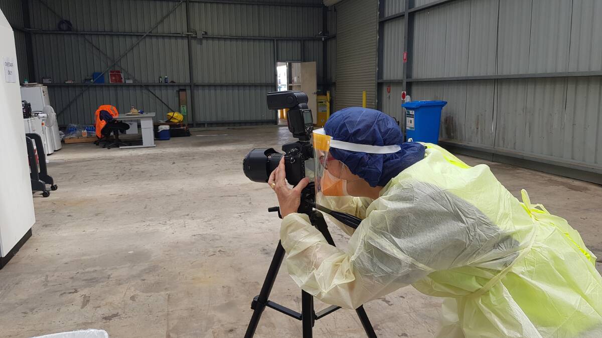 Photographer Marzena Wasikowska in PPE as she took hundreds of images of frontline health workers in Canberra during the pandemic. Picture supplied 