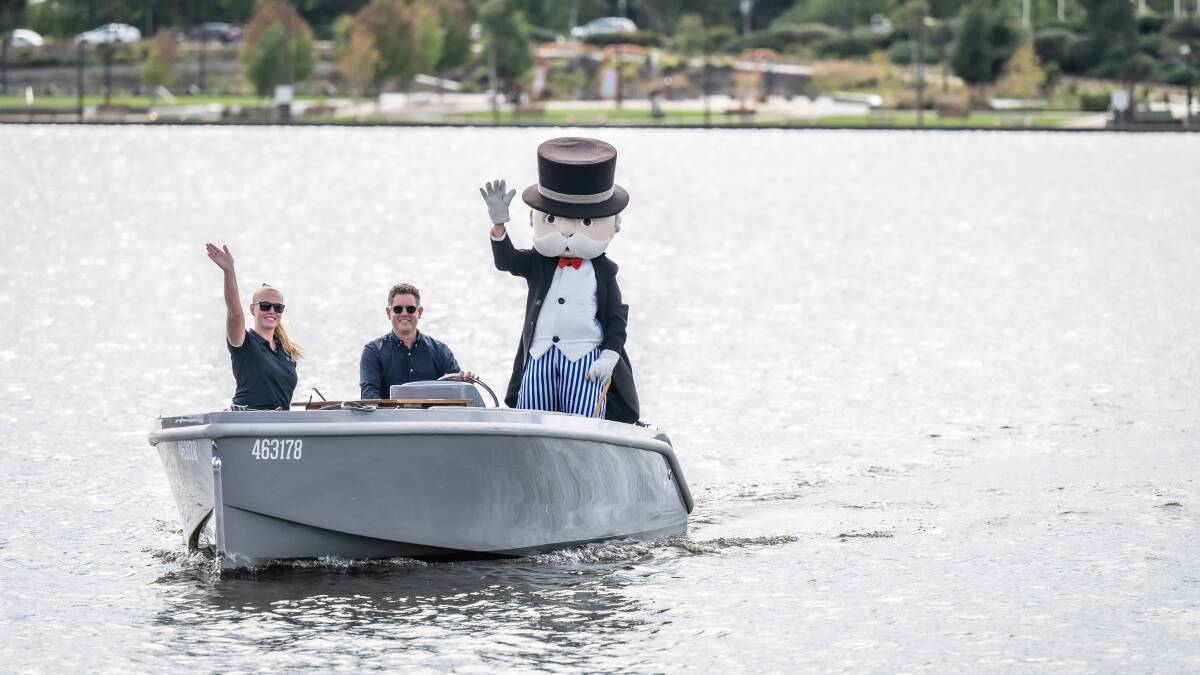 Mr Monopoly arrived to the Canberra launch on a GoBoat captained by GoBoat owner Nick Tyrrell. Picture by Karleen Minney
