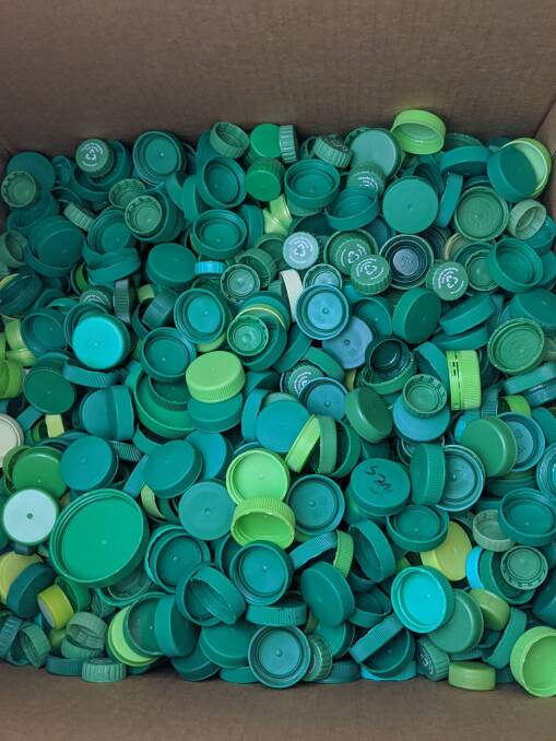 50,000 lids are dropped to Tim's Aranda home each week. Picture: Megan Doherty
