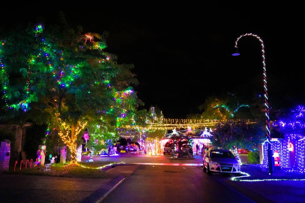 Christmas light decorations in Burraly Court, Ngunnawal, are the result of a combined effort among neighbours. Picture: Sitthixay Ditthavong