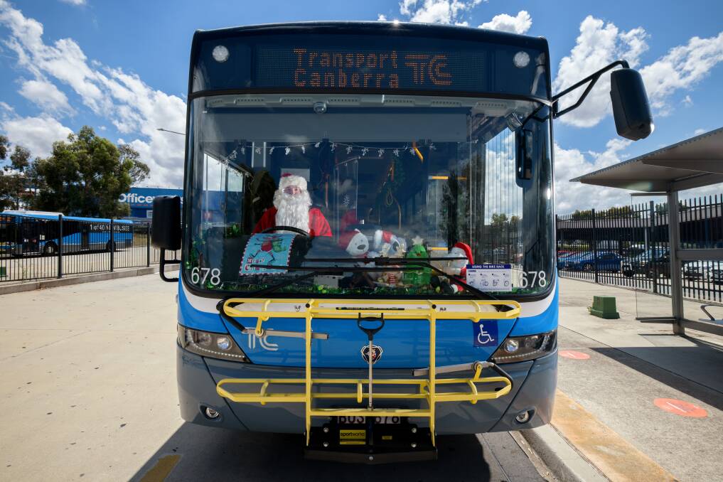 Festive bus driver Michael Hoare. Pictures: Sitthixay Ditthavong
