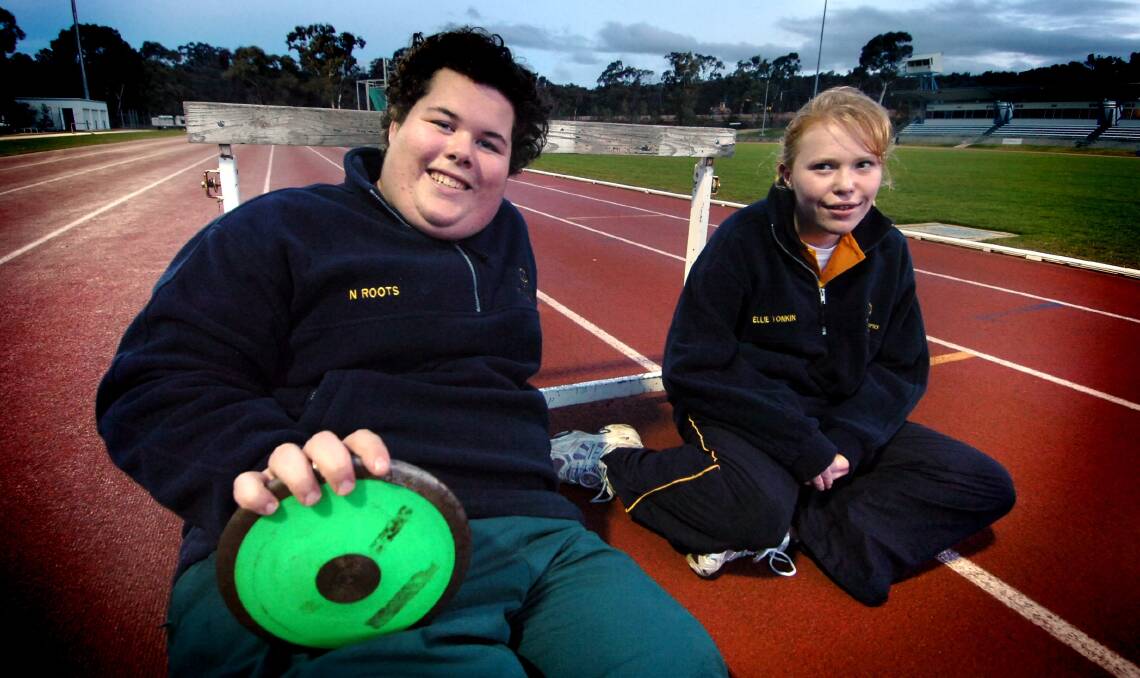 Nick Roots in 2006 aged 17, with Ellie Tonkin, at athletics training. Picture by Marina Neil 
