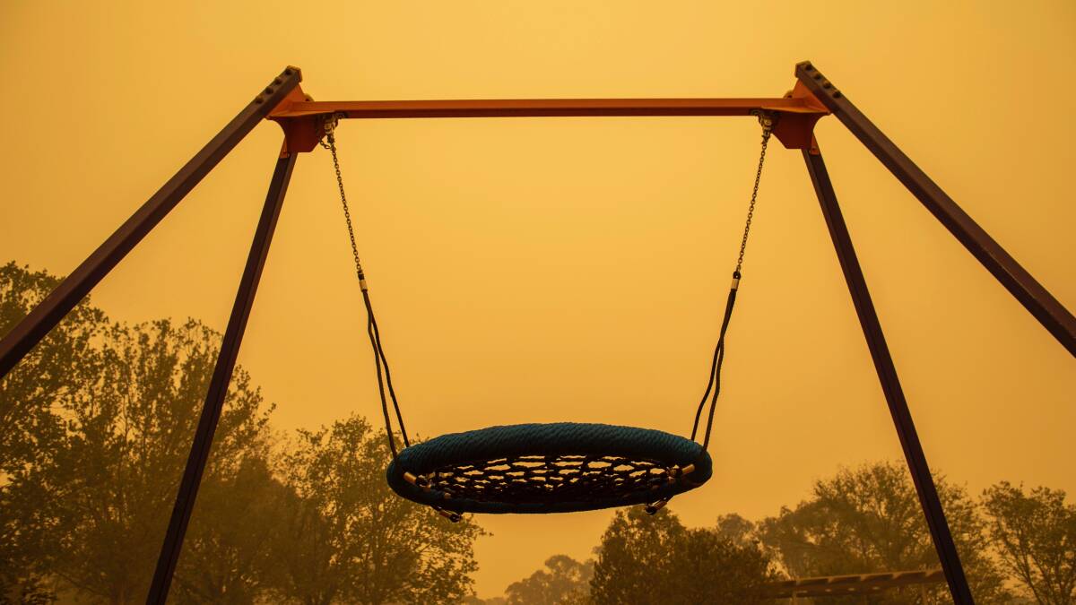 A playground against the unsettling orange of a bushfire smoke sky. Picture: Supplied