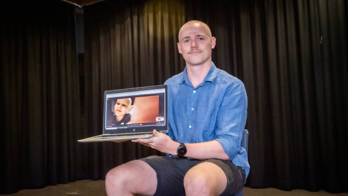 Calwell Primary School year two teacher Jack Beattie shaved his hair in support of his student Zach Jego, 7, who was online watching from Sydney where he is receiving treatment for cancer. Picture by Karleen Minney