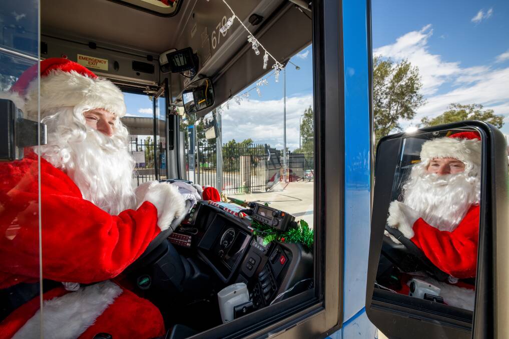 ACTION bus driver Michael Hoare's favourite time of the year is Christmas. Picture:Sitthixay Ditthavong