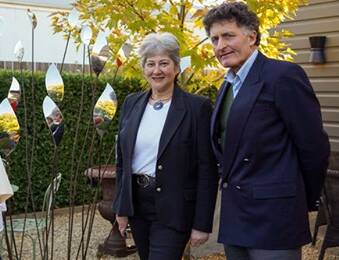 British high commissioner Vicki Treadell and event host Michael Bligh with a David Harber sculpture at Manon and Moss in Bungendore. Picture: Supplied