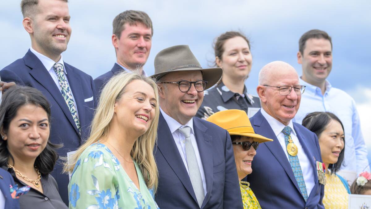 The PM with partner Jodie Haydon and Governor-General David Hurley and Linda Hurley with the new Australians. Picture by Keegan Carroll 