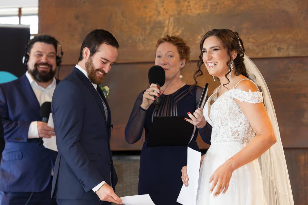 The couple's heartfelt and funny vows were written by MIX 106.3 breakfast presenter Nigel "Nige" Johnson (far left). Picture: Sitthixay Ditthavong