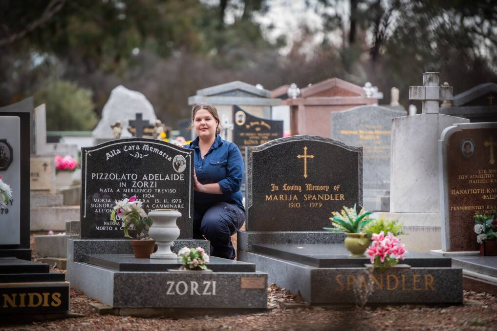 Michelle Dariol with her great-grandmother's grave at the Gungahlin Cemetery. Her great-grandmother was buried there the year the cemetery opened, in 1979. Picture: Karleen Minney