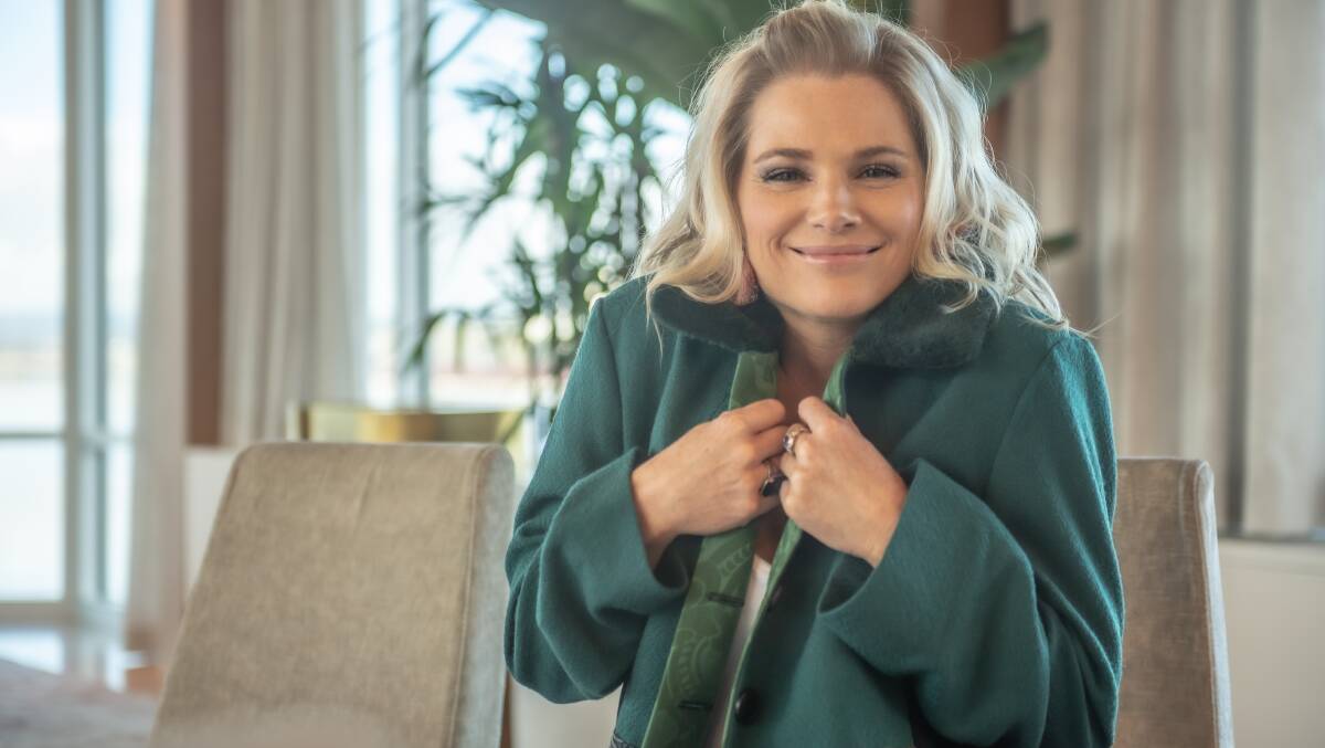 Leanne Castley in a cosy green coat by Planet Fab. She is in the new The Marion function centre at Regatta Point. Picture: Karleen Minney