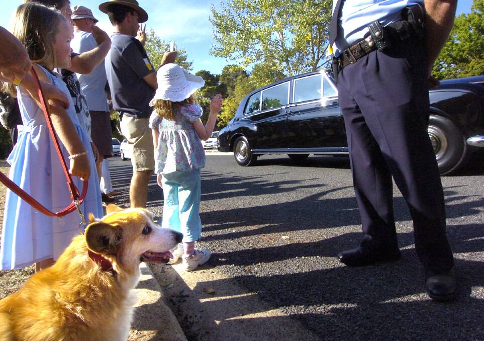 Winston the corgi from Bruce (and her owner Francyne Broughton) made it to Government House to welcome the Queen in 2006 as she arrived at Government House. Picture by Gary Schafer