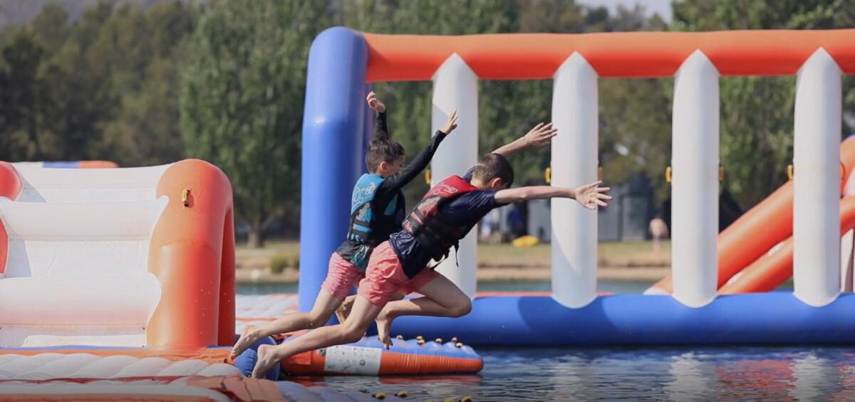 The owners of the Canberra Aqua Park have noticed a general increase in the use of the lake this year, including by swimmers. Picture: Supplied