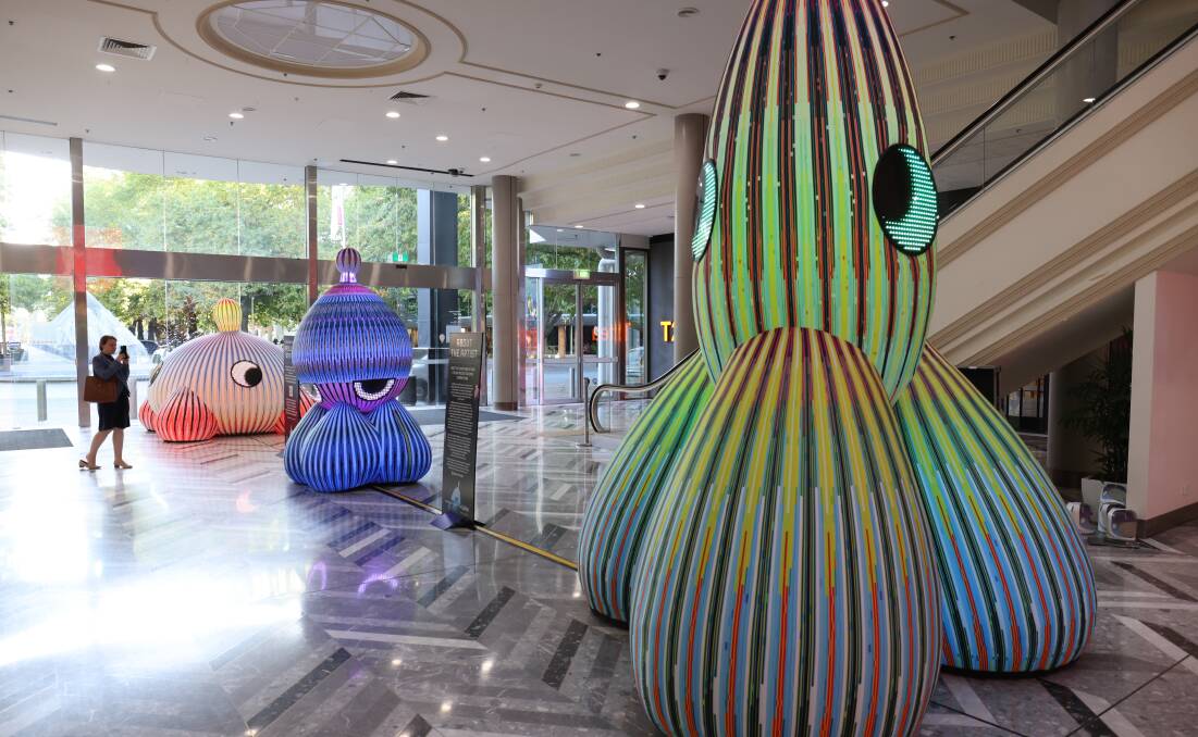 "Motion sensor eyes will follow you as you walk past...." More inflatable fun at the Canberra Centre. Picture by James Croucher