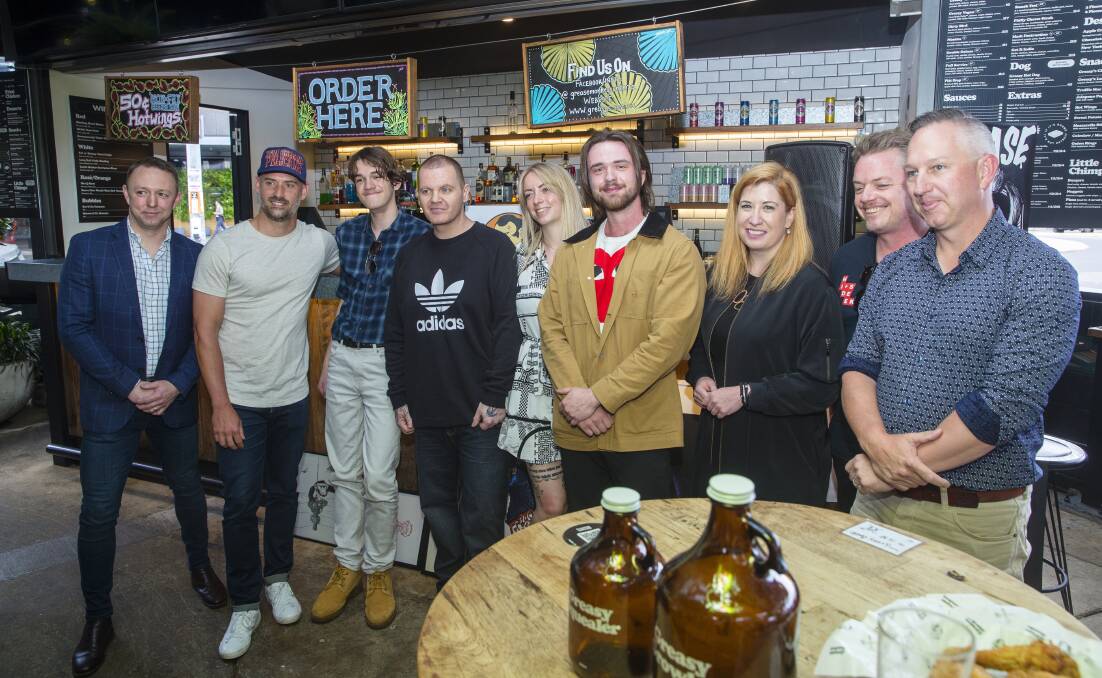 At the Greasybalds announcement (l-r) Grease Monkey owner Nick Tuckwell, Martin Vant (minor prize winner), Nathan Garrard (highly commended), Michael Steele (runner-up), Danielle O'Reilly (highly commended), Liam Pope (winner), Arts Minister Tara Cheyne, artist and judge James Manning and The Canberra Times food critic and judge Chris Hansen. Picture by Keegan Carroll