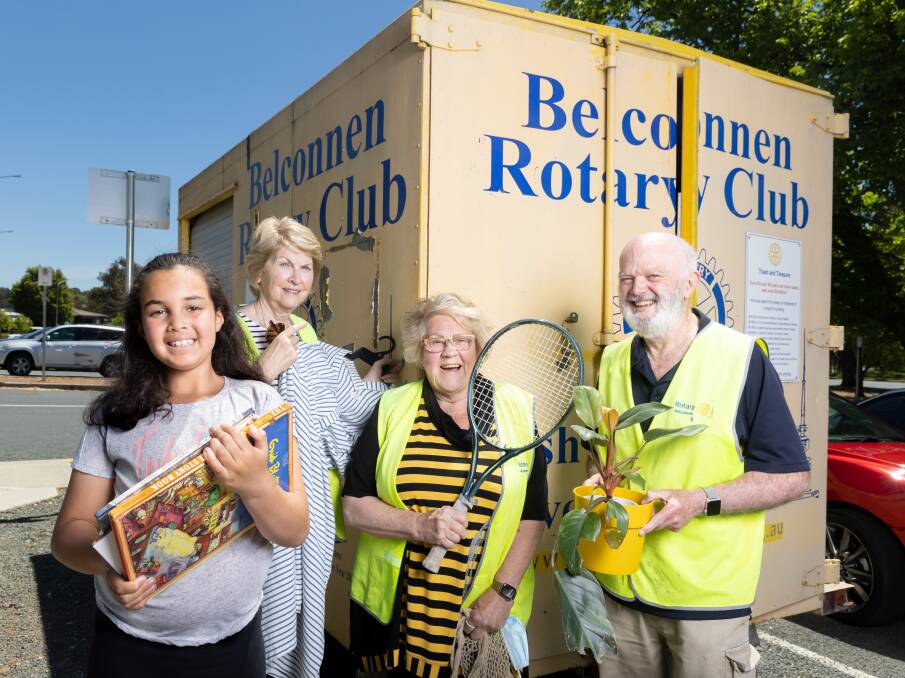 Young bargain hunter Amhara Perry, 9, and Rotary Club of Belconnen members Linda Baldwin, Judy Perry, and Leo Farrelly are excited to be back to full capacity this weekend. Picture: Sitthixay Ditthavong