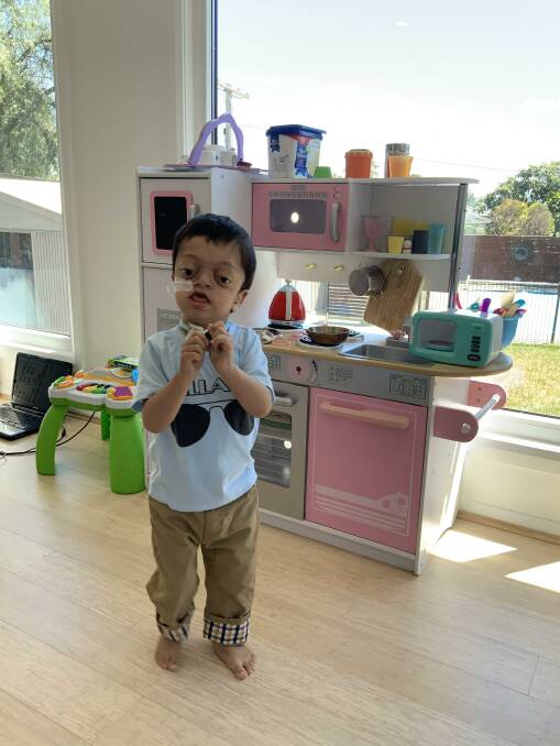 Divyank Kc had tracheostomy surgery in September to help with his breathing.