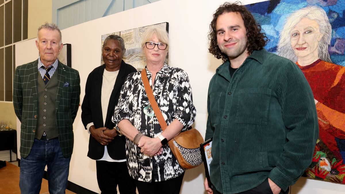Winners of the 2022 National Capital Art Prize winners (left to right) John Rowe (open category), Dianne Tchumut (First Nations category), Dawn Duncan-Smith (Sustainability category) and Daniel Leone (People's Choice Award) at the Fitters Workshop on Wednesday night. Picture by James Croucher