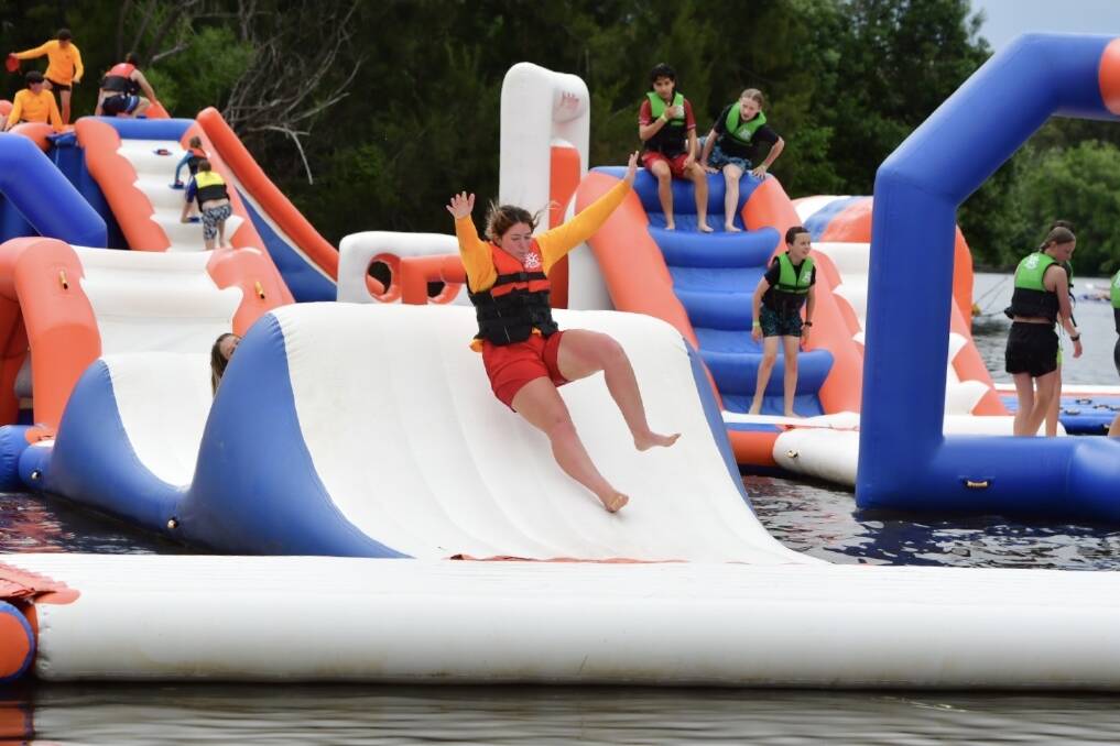 Life guard Lilli Thomas tries out the Canberra Aqua Park on Thursday ahead of its official opening on Friday. Picture: Elesa Kurtz