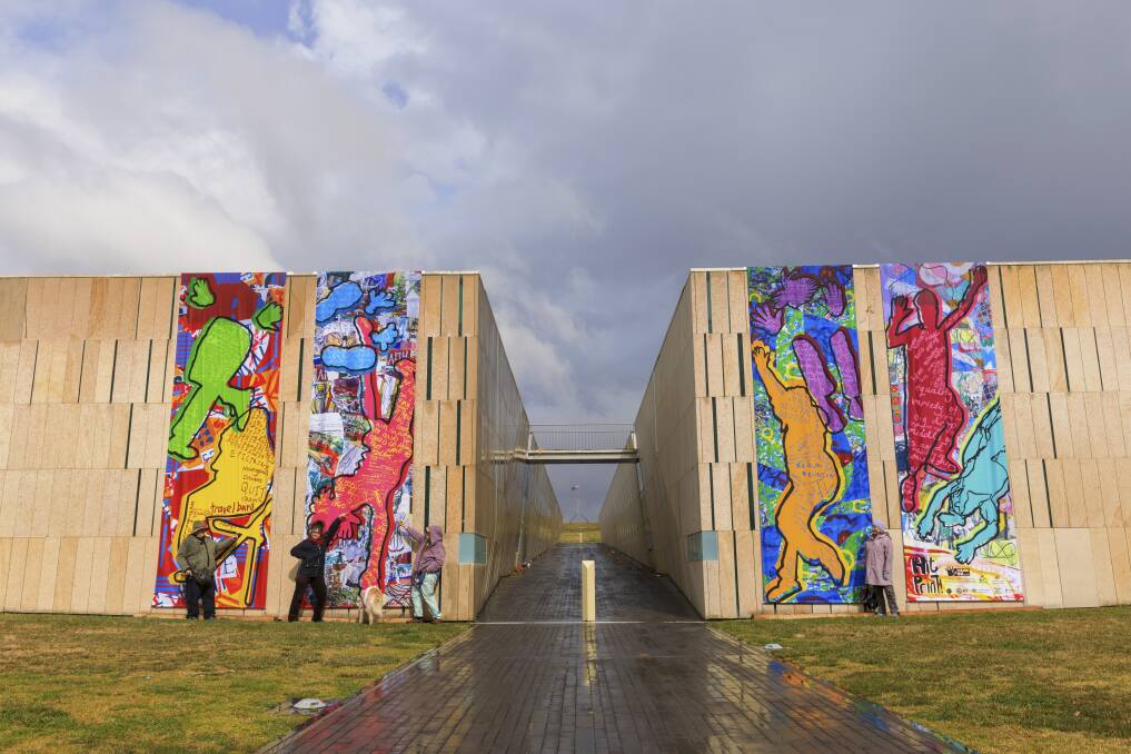 The art was digitally enlarged and printed on to the banners, which are 6.3-metres-high. Picture: Keegan Carroll