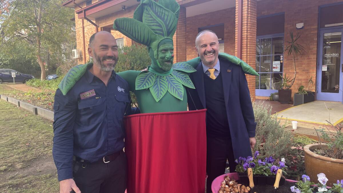 The plant man with Mr Howard and Chief Minister Andrew Barr. Picture by Megan Doherty