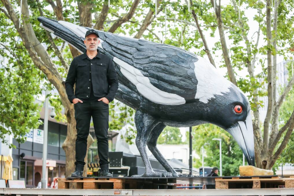 Big Swoop on his first day in Garema Place back in March with creator Yanni Pounartzis. Picture by James Croucher