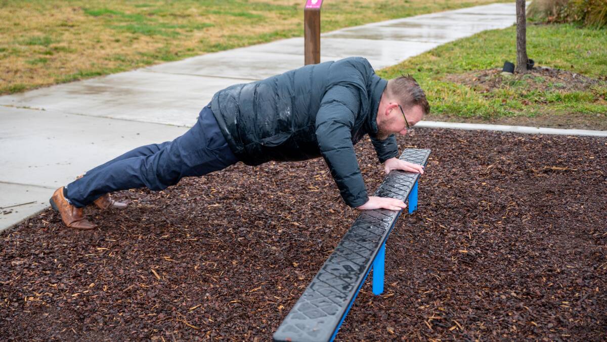 Queanbeyan-Palerang mayor Kenrick Winchester tries out the fitness loop. Picture: Supplied