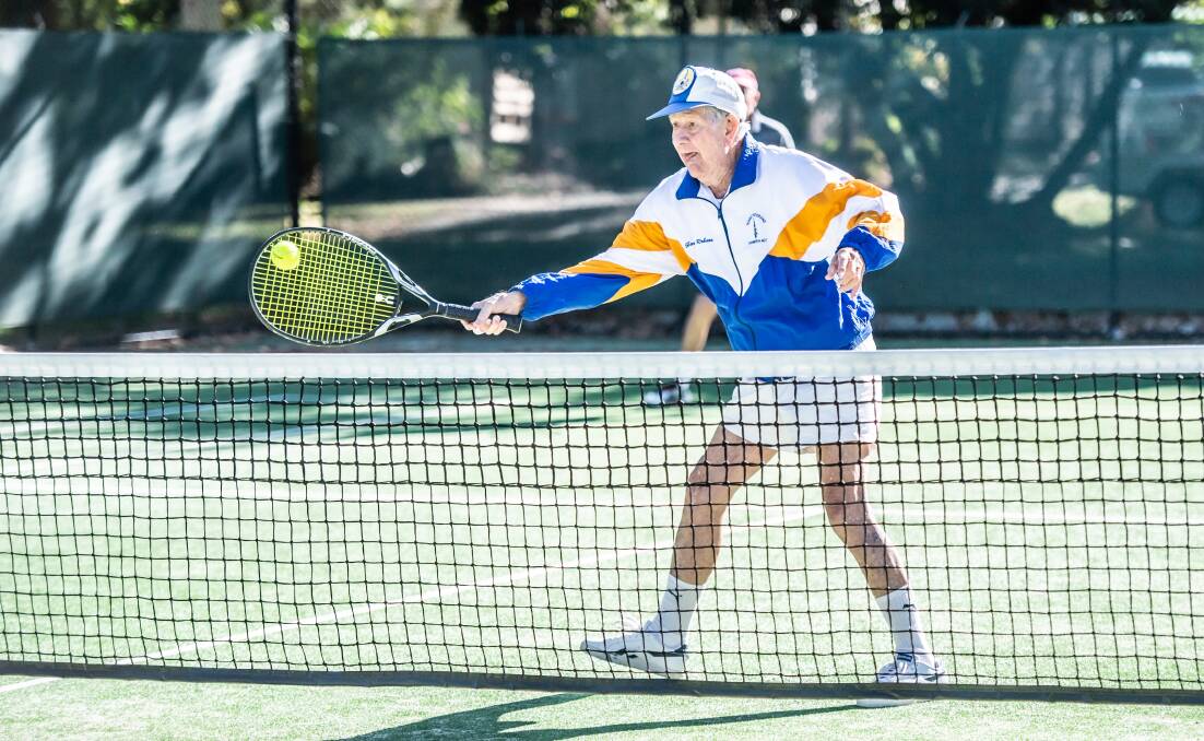 Gordon Robson gets one over the net on Friday, the day after his 90th birthday. Picture by Karleen Minney