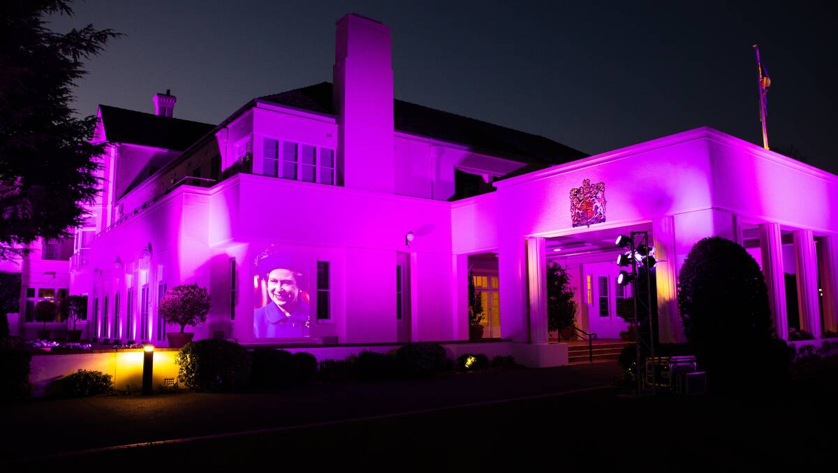 Images of the Queen through the decades were also beamed on to Government House in Canberra on Monday night. Picture by Jake Sims