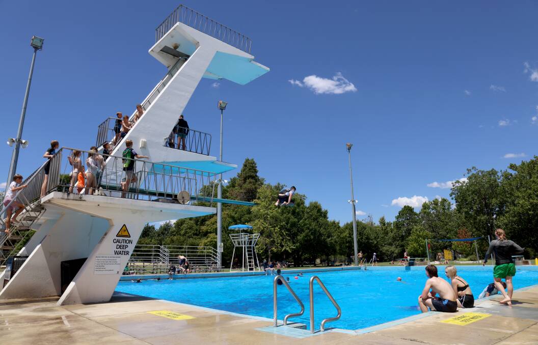 The diving pool at the Canberra Olympic Pool facility in Civic is a popular place for young people in summer. Picture by James Croucher 