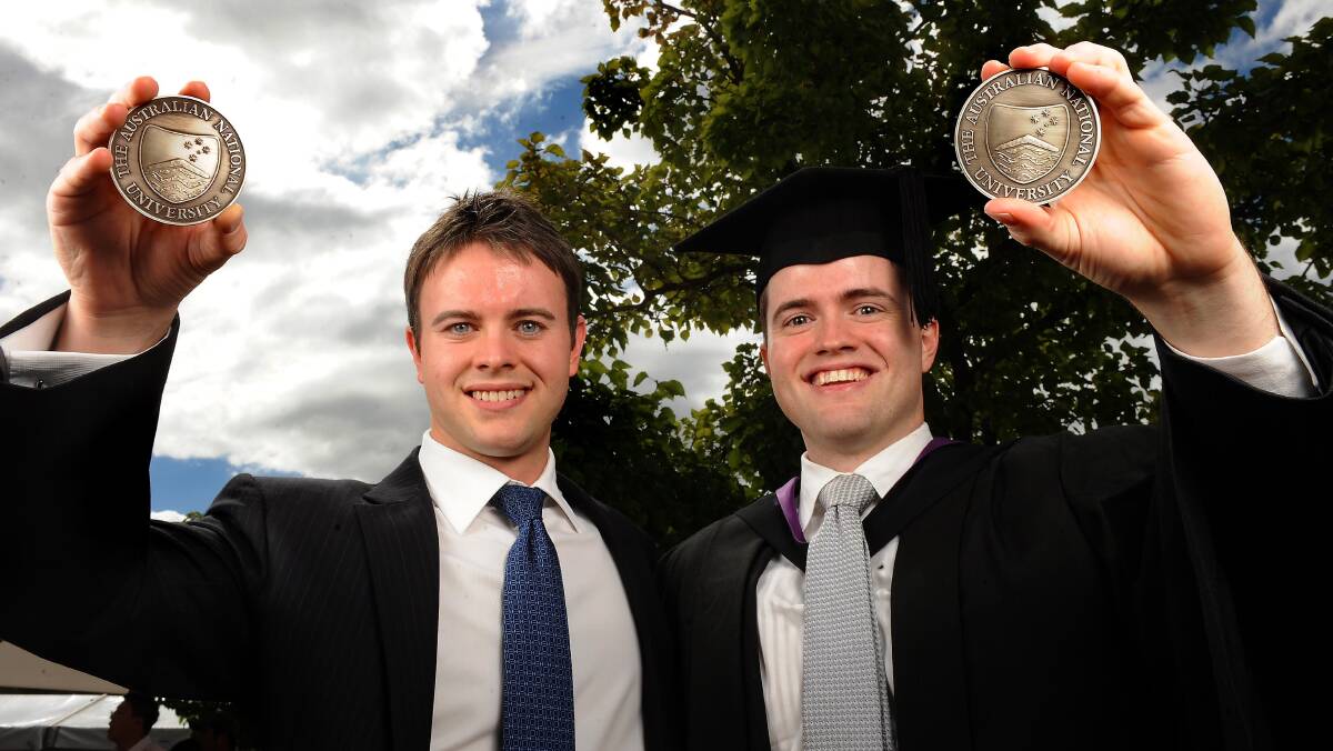 A talented family: Aiden Hallett, left, with his brother Kyle in 2011. Aiden won the ANU University Medal for Finance while Kyle won the University Medal for Law. Picture by Gary Schafer