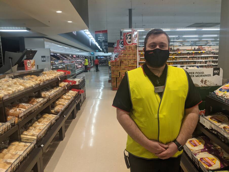 Tuggeranong Coles store manager Beau King in the store on Friday. Picture: Megan Doherty