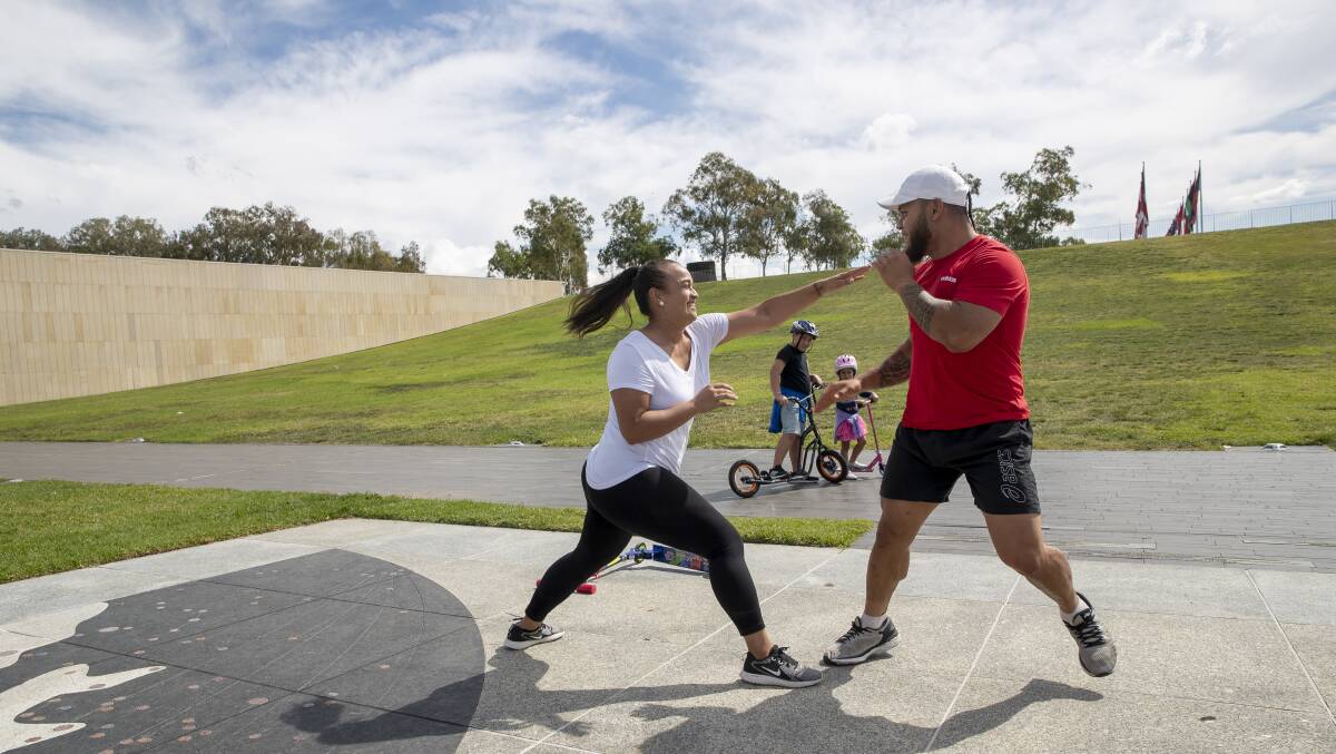 Chelley Penn and Stope exercising at Queen Elizabeth Terrace on the weekend. Picture: Sitthixay Ditthavong