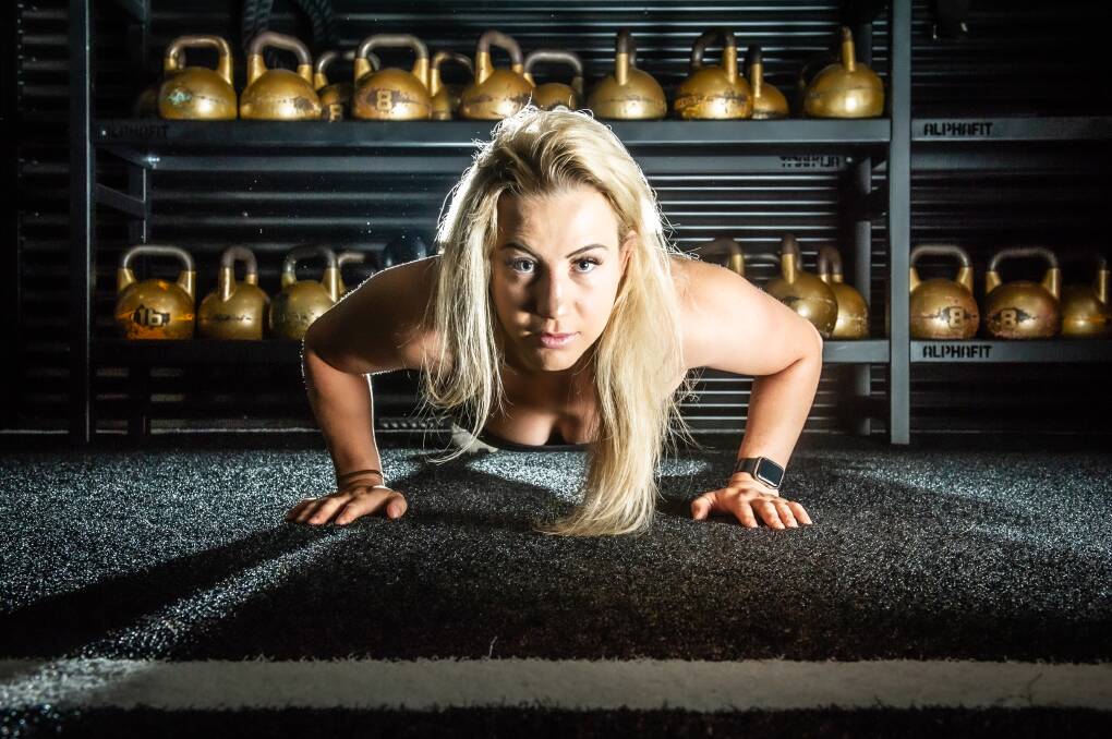 Hiit Republic Mitchell studio manager Bec Bennett, will attempt to break the world record of burpees completed in one hour. Picture: Karleen Minney