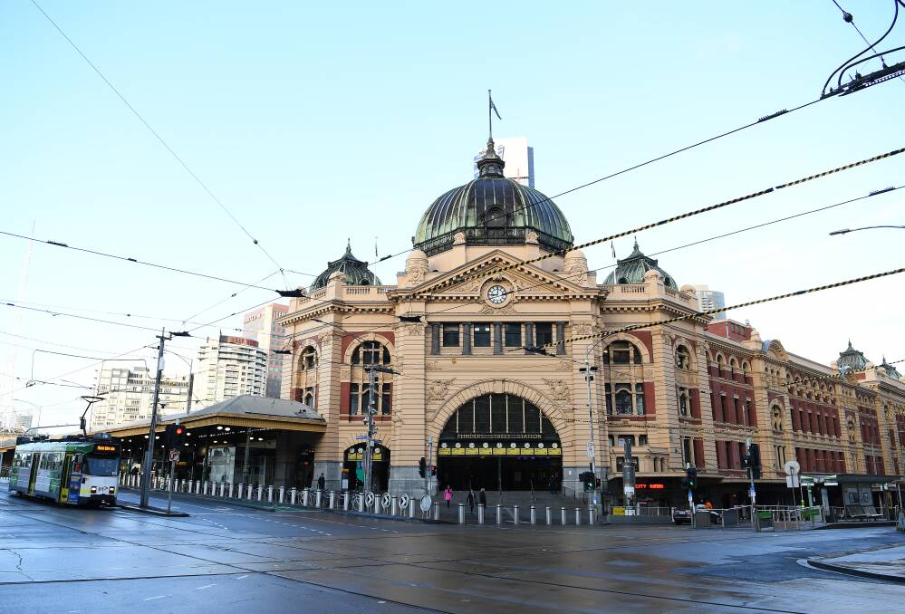 An empty Flinders Street station as the lockdown hits Melbourne. Picture: Getty