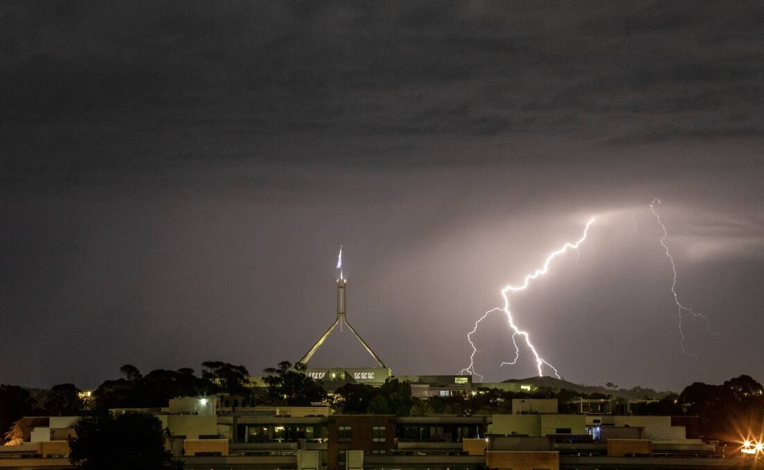 Lightning over Parliament House in January. Picture: Sitthixay Ditthavong
