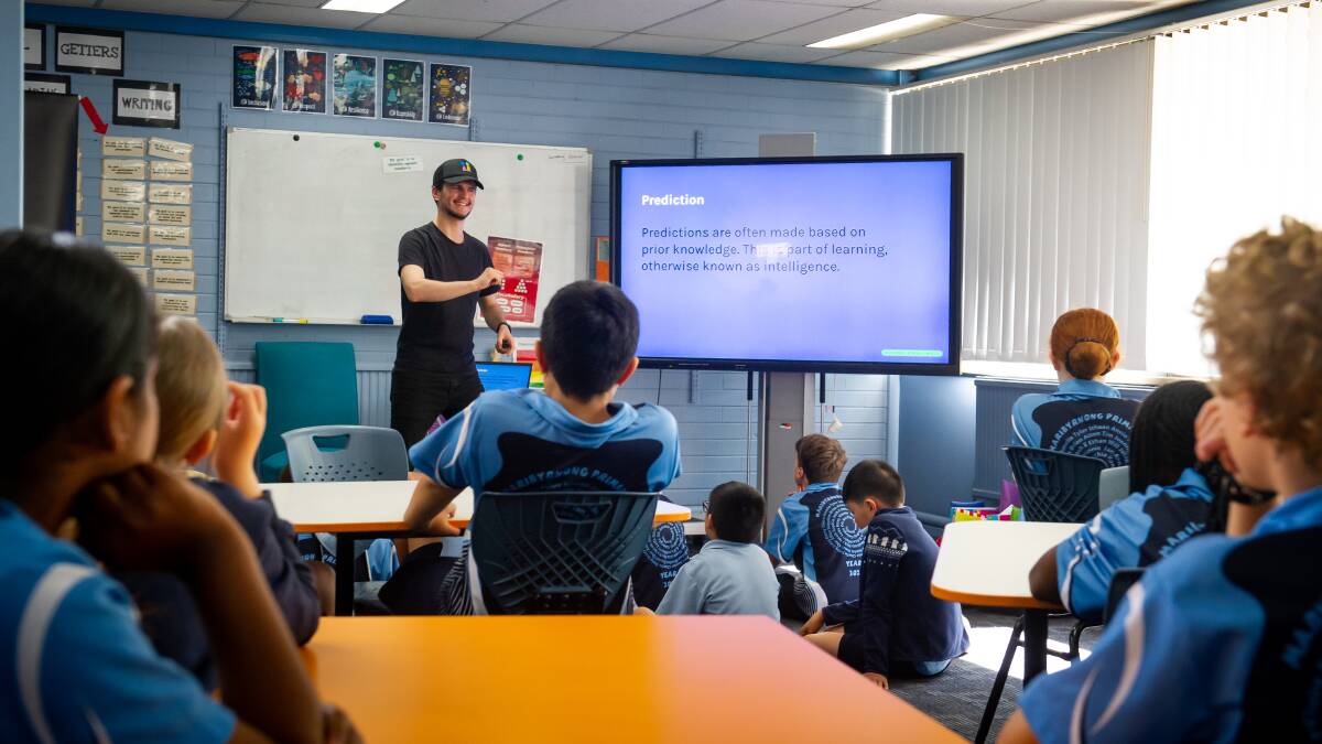 Day of AI facilitator Zach Wingrave teaches Maribyrnong Primary School students about the fundamentals of artificial intelligence. Picture by Elesa Kurtz