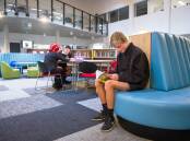 Belconnen High School was remodelled in 2019. Then year 10 students Malek Elfeky, Isaak Lyons and Campbell Marris in the school new learning commons. Picture by Elesa Kurtz