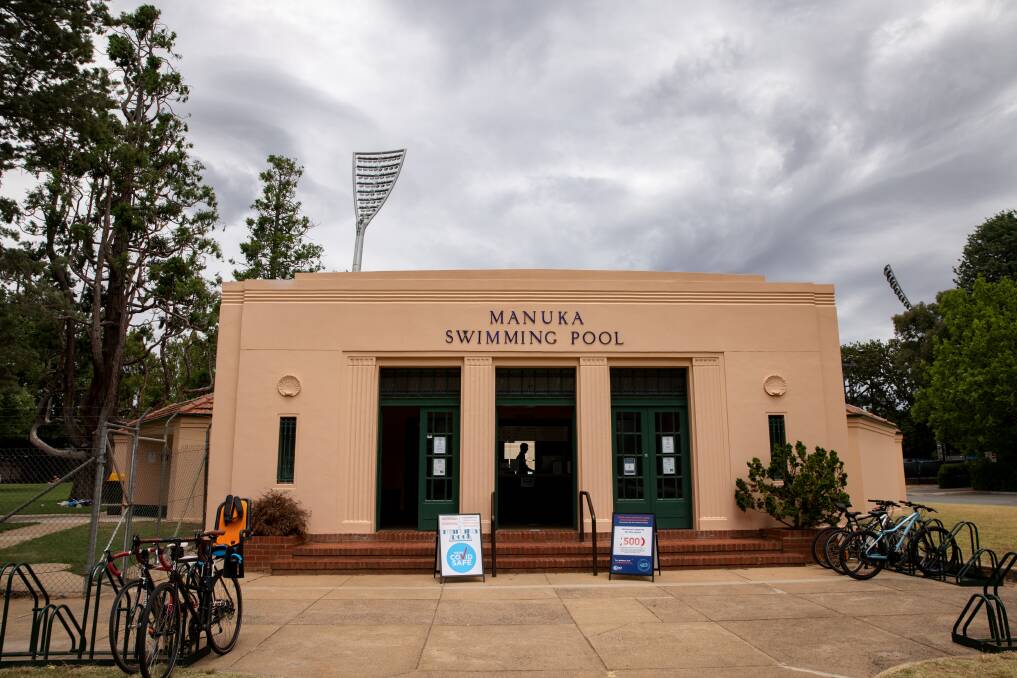 The Manuka Pool walls were painted salmon and trims, changeroom benches and bike racks were painted Brunswick green as part of a major renovation. Picture: Sitthixay Dittavong