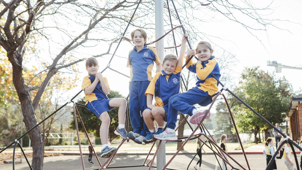 Felicity, 6, Ashton, 7, Xander, 6, and Lily, 7 attend St Bede's Primary School, where the future is looking a little brighter. Picture: Dion Georgopoulos
