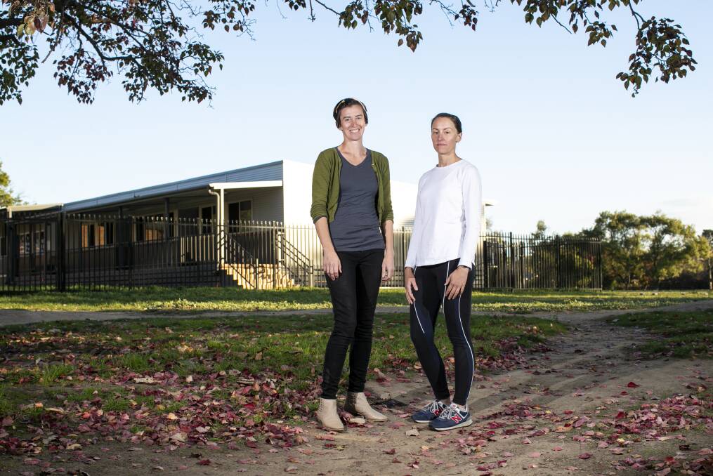 North Ainslie P&C president Maree Wright and preschool parent Brooke Anderson are worried about the capacity at the school, which already has four classes in transportable classrooms. Picture: Keegan Carroll
