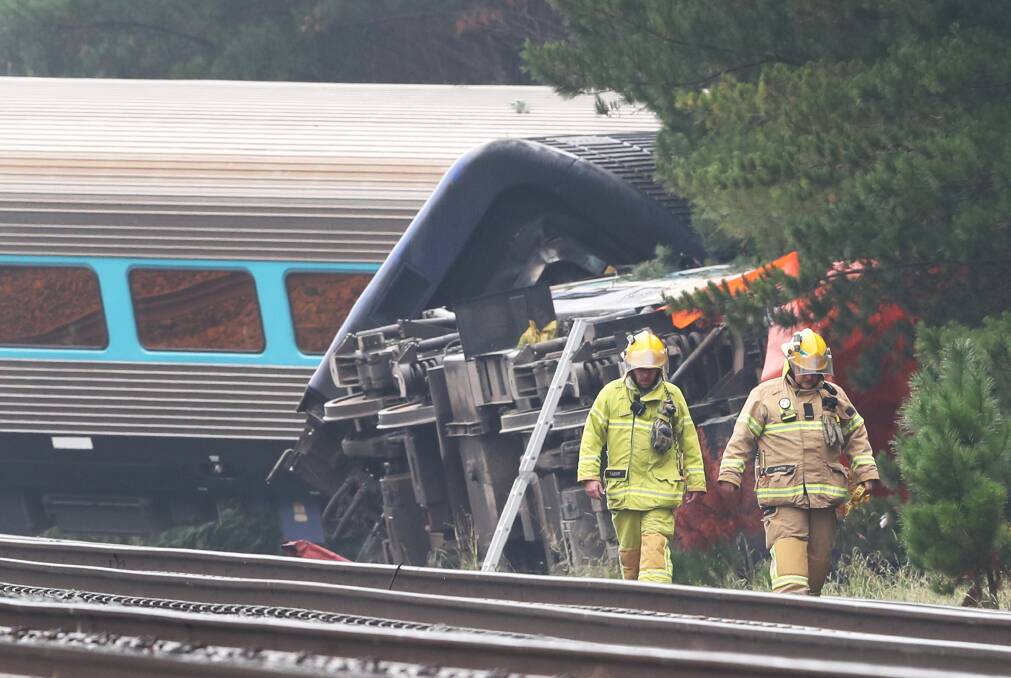 A train driver and another train worker have been killed and several passengers injured in a derailment north of Melbourne. Picture: AAP