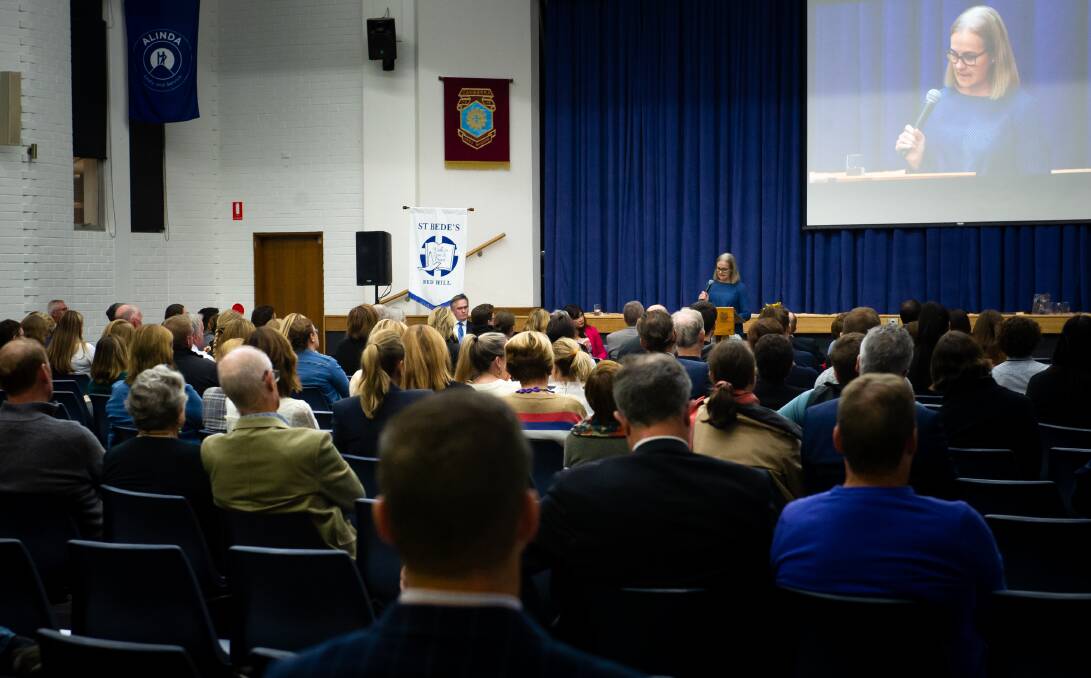 St Bede's parent Kate Stuart speaks at the town hall meeting on the future of the school. Picture: Elesa Kurtz
