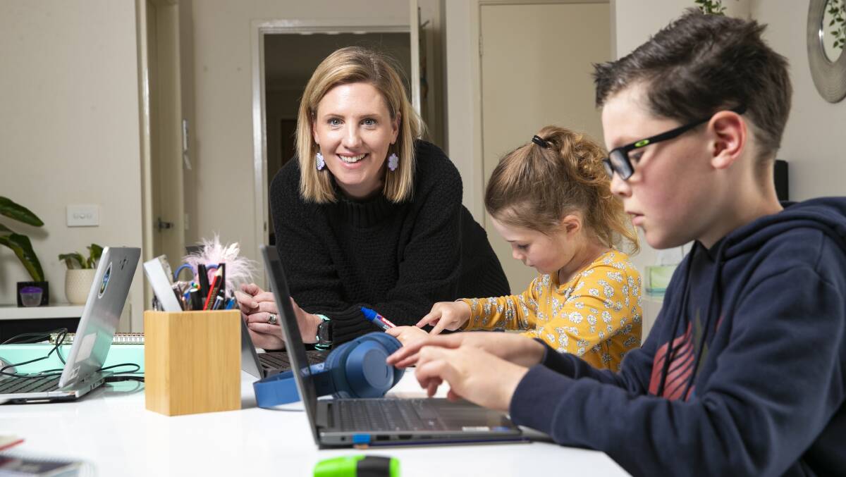 Renee Broadhurst has been teaching her year 4 class remotely while also supervising her children Amelia, 6, and Harvey, 9, during Canberra's lockdown. Picture: Keegan Carroll