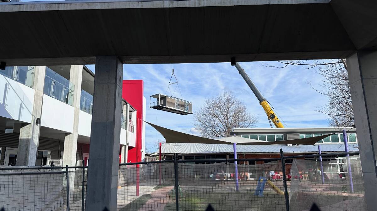 Prefabricated classrooms being installed at the Lyneham campus in July. Picture supplied