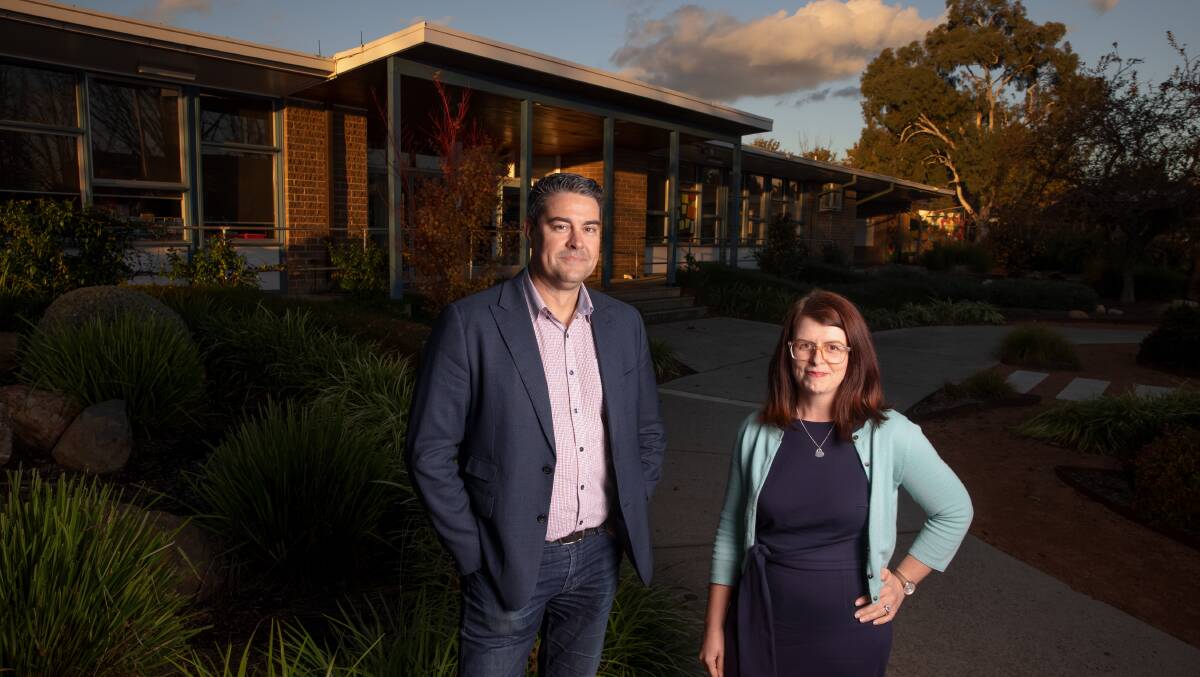 Majura Primary School P&C convenor Dan Rowley and member Penny Edwards are concerned about capacity issues at the growing school. Picture: Sitthixay Ditthavong