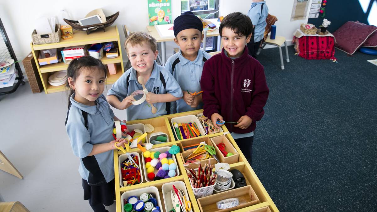 Theresa, Benjamin, Harjita and Xavier are preschool students at St Thomas Aquinas Early Learning Centre in west Belconnen. Picture: Keegan Carroll