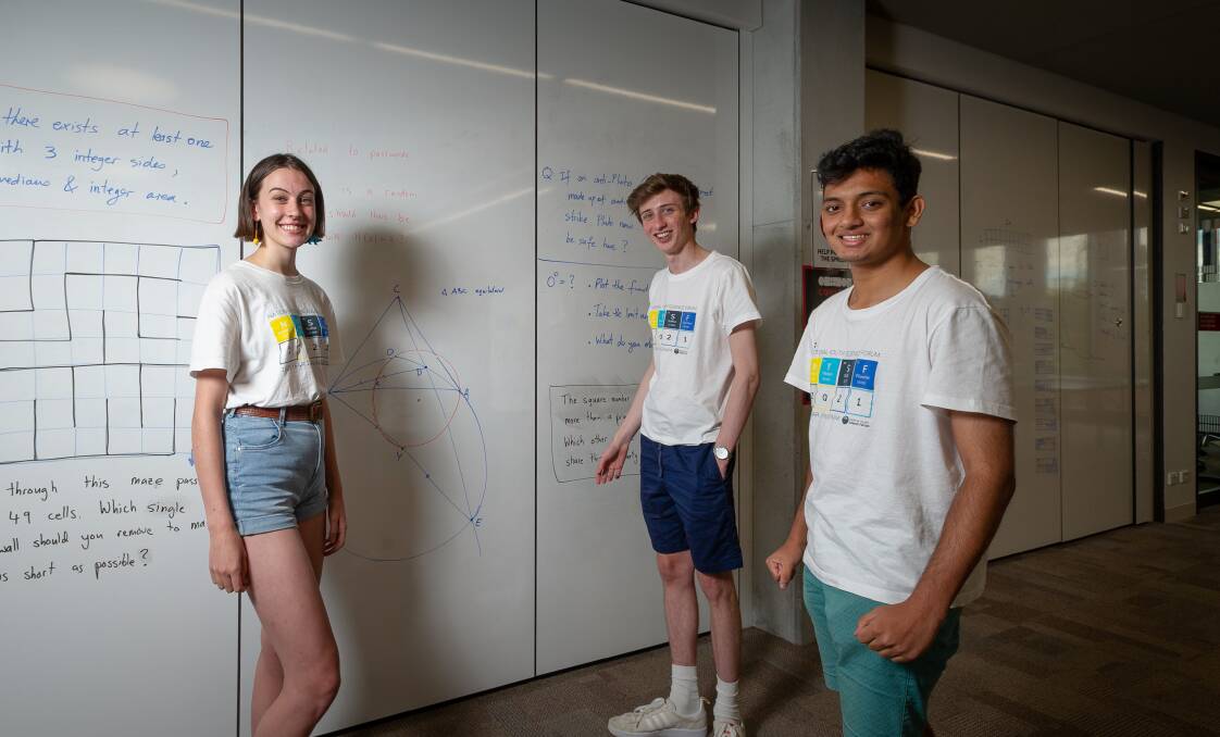 Year 12 students Angela Weckert, 16, Owen Foster, 15, and Sithum Dissanayake, 17, take part in the National Youth Science Forum at the ANU. Picture: Elesa Kurtz